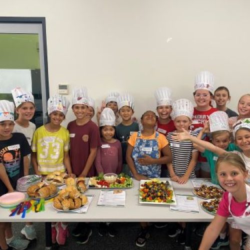 Group shot of kids participating in the Junior Kitchen workshop
